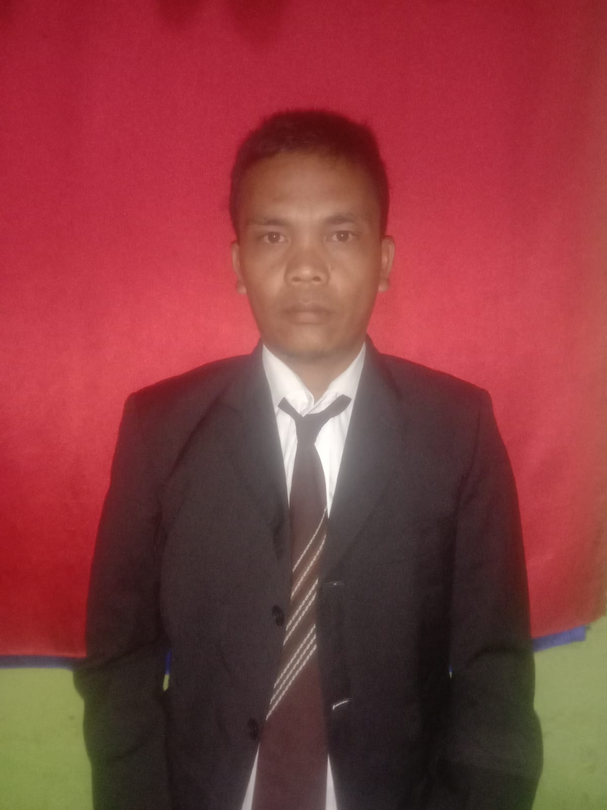 <center><br>Dahlan Siringoringo, S.Pd.</center>