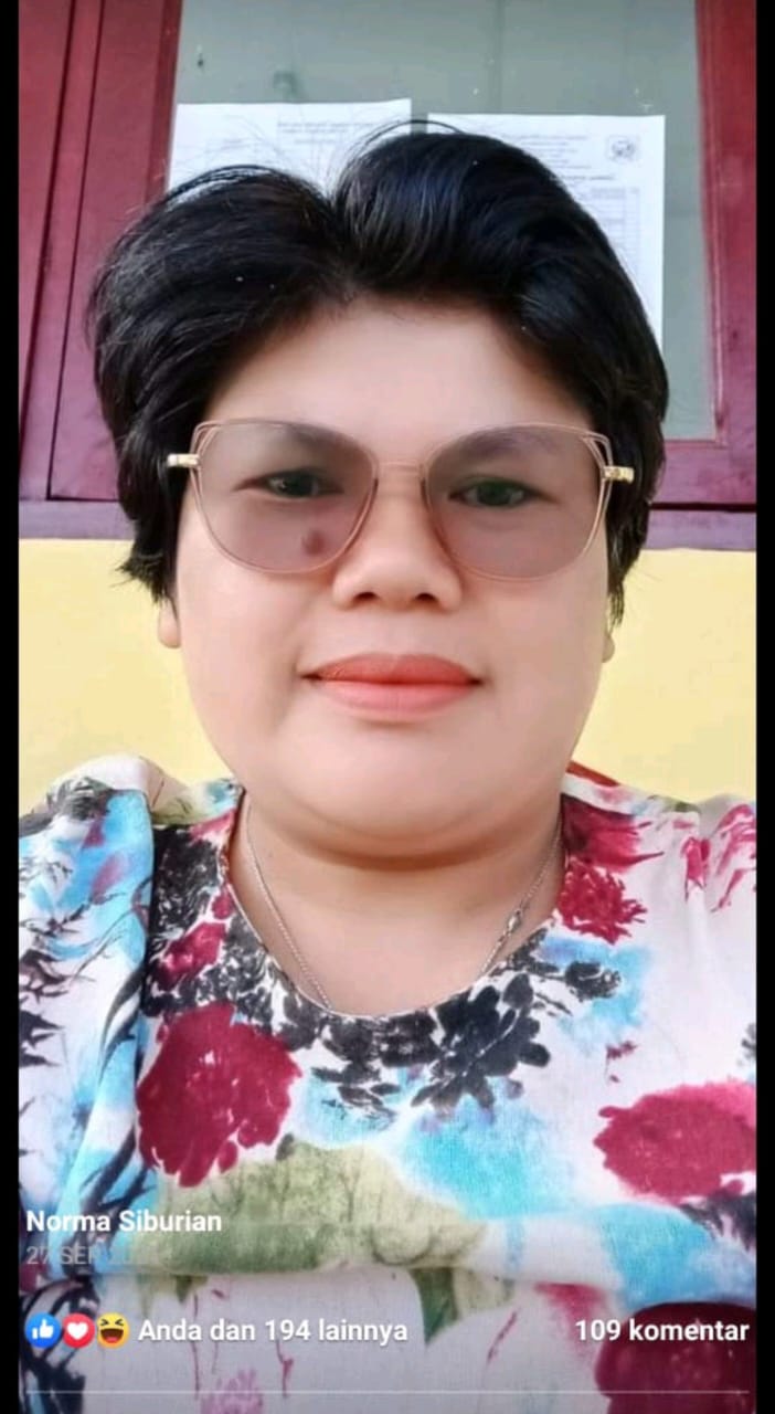 <center>Wali Kelas IX-2<br>Nurmawati Norma Siburian, S.Pd</center>