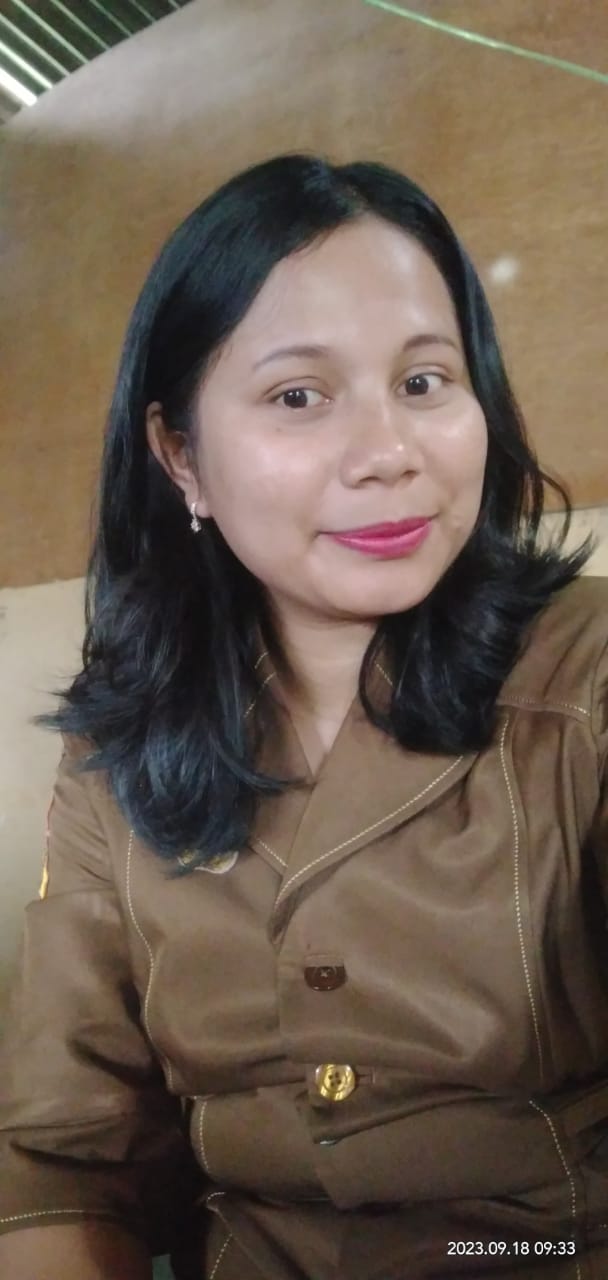 <center>Wali Kelas IX-3<br>Theresia Lia E. Gultom, S.Pd.</center>